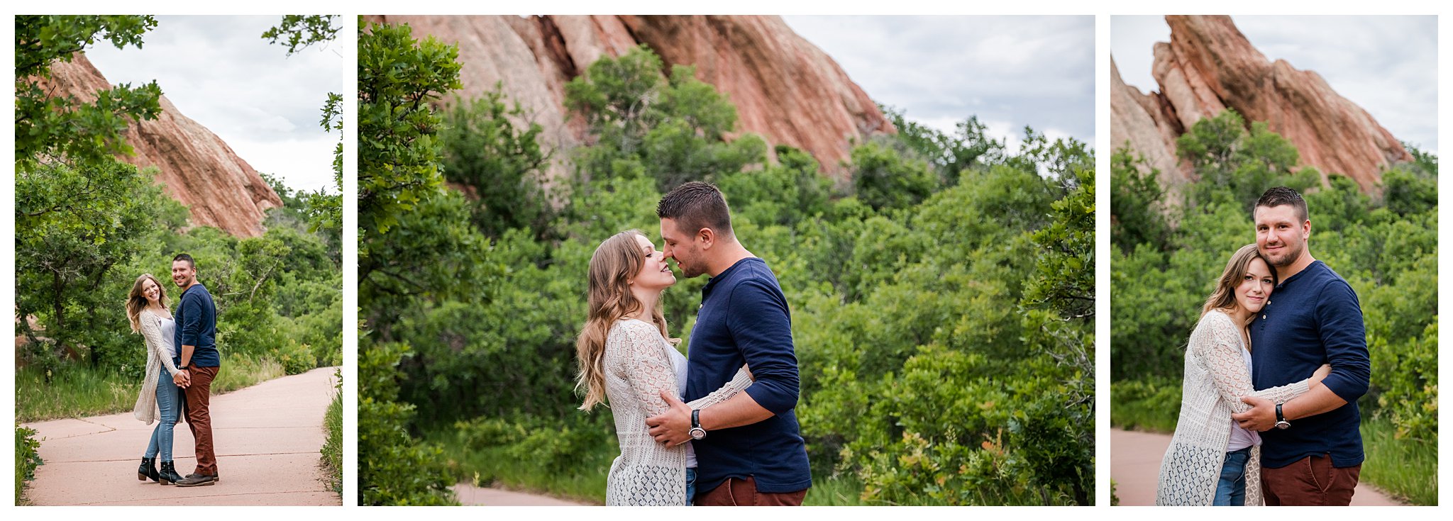 Couple poses for engagement session in front of lush green trees and red rocks