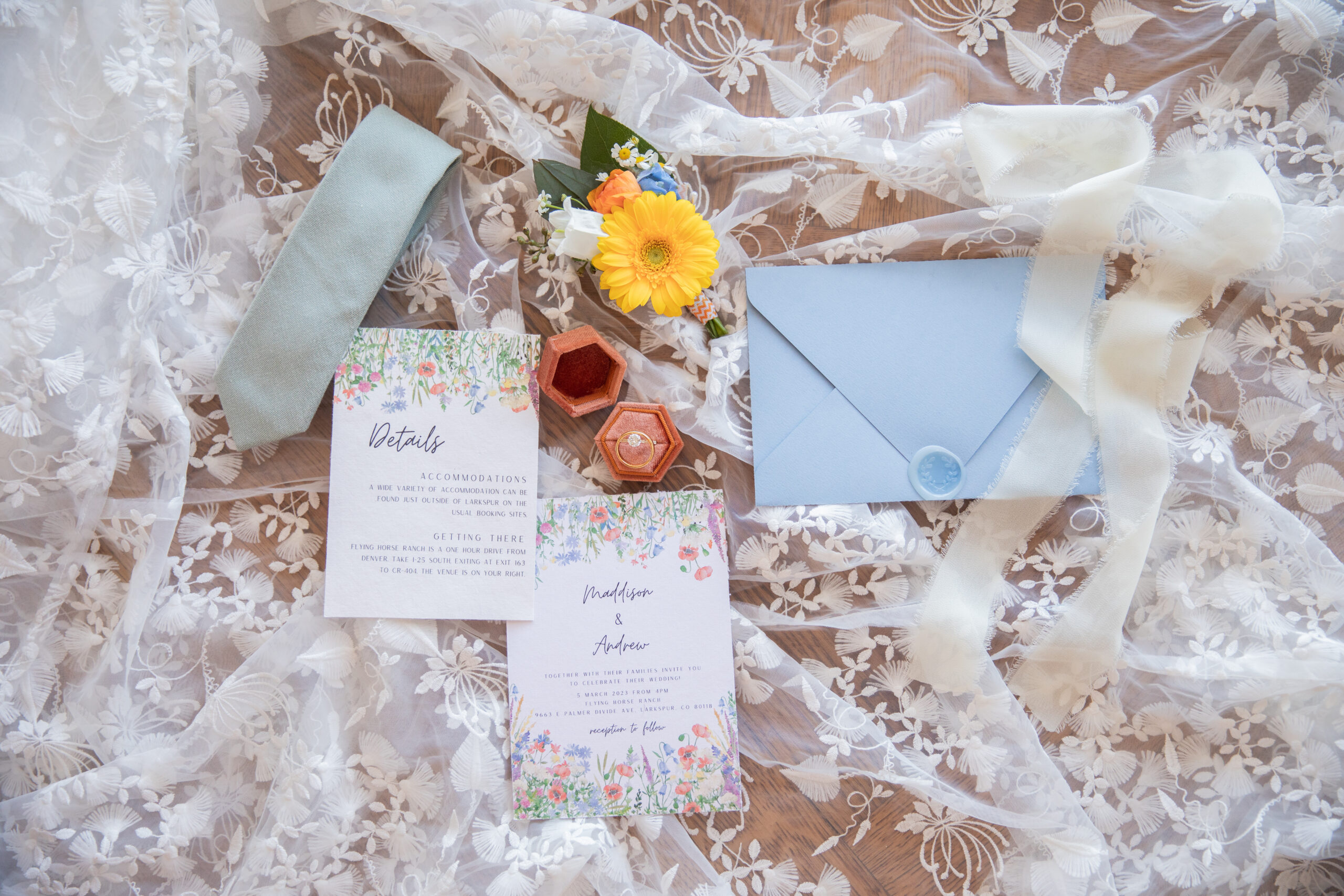 Detail shots of lace, invitations, rings, and more.