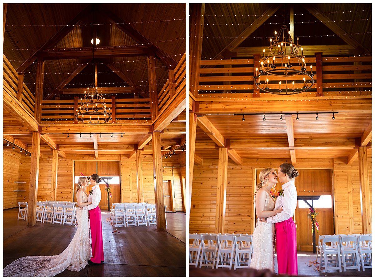 The brides dance underneath a chandelier in the barn of this spring wedding inspiration photo shoot.