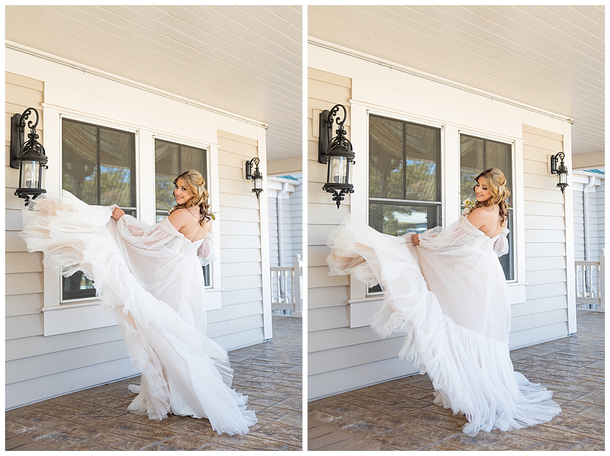 A bride twirls her dress around on the porch of a mansion.