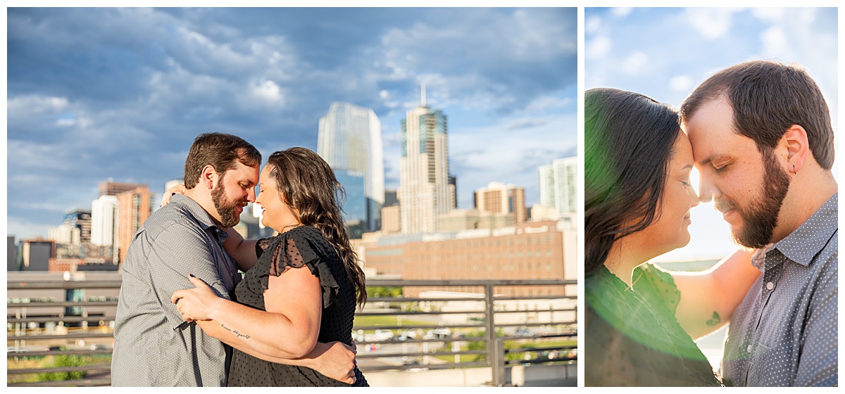 A couple in black and gray pose on top of a parking garage overlooking the city skyline of Denver, CO
