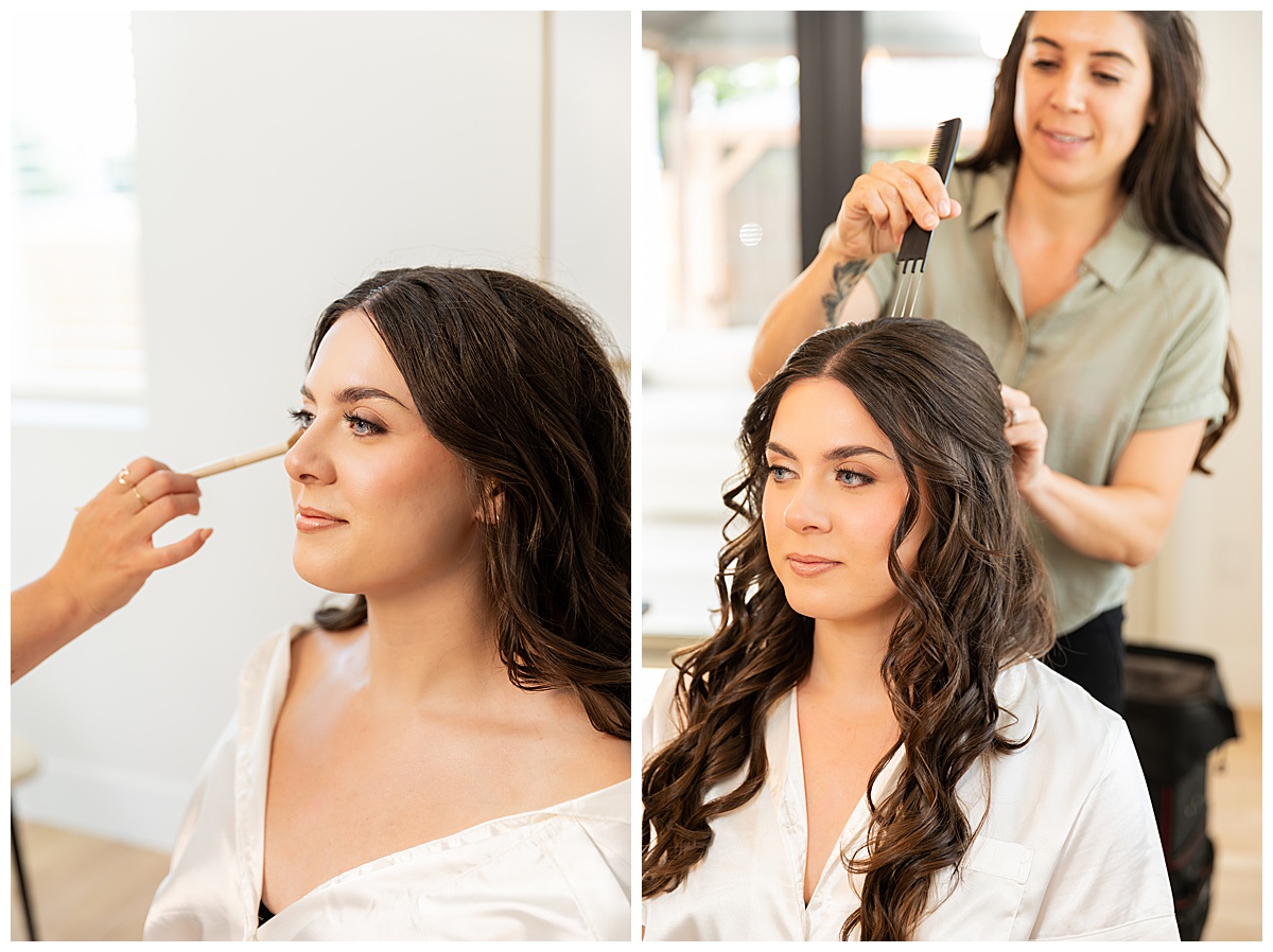 The bride gets her hair and makeup done in her AirBnb rental. She has blue eyes, fair skin, and long dark brown hair. She is wearing a white silk PJ set.