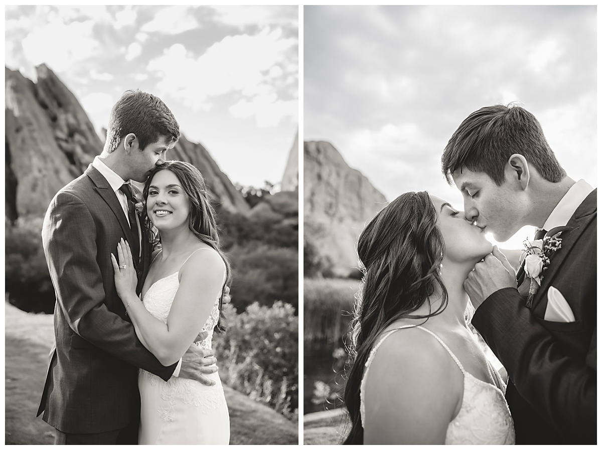 The couple pose on the golf course for bridal portraits. She is holding her bouquet. There are big red rocks in the background. The photos are in black & white