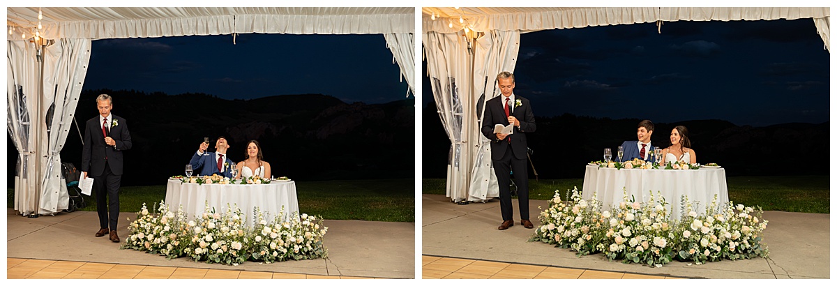 The bride and groom laugh during the father of the bride's toast. It is nighttime and they are under the reception tent.