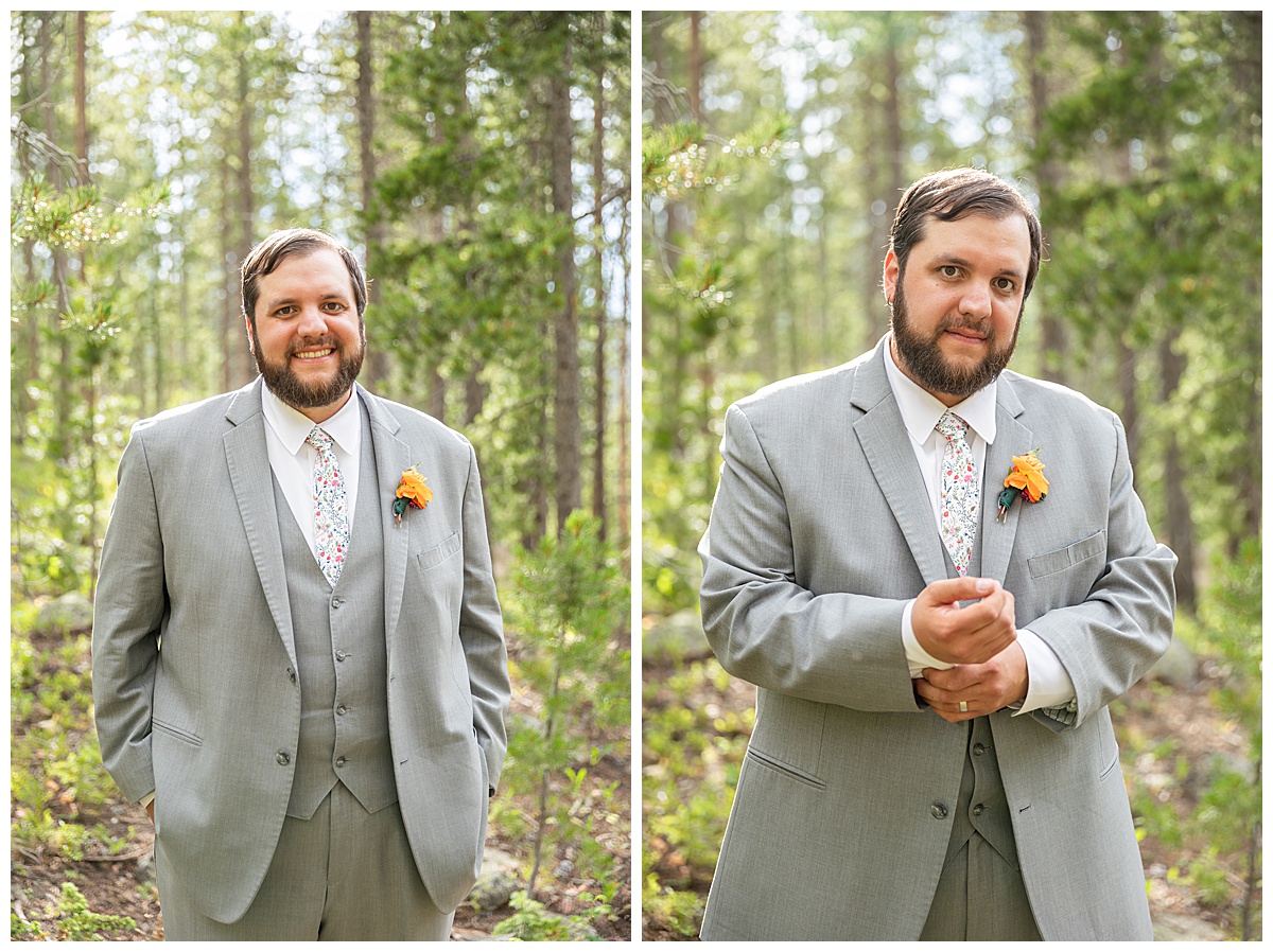 The groom takes solo photos. He is wearing a gray suit, a floral tie, and a yellow boutonnière. 