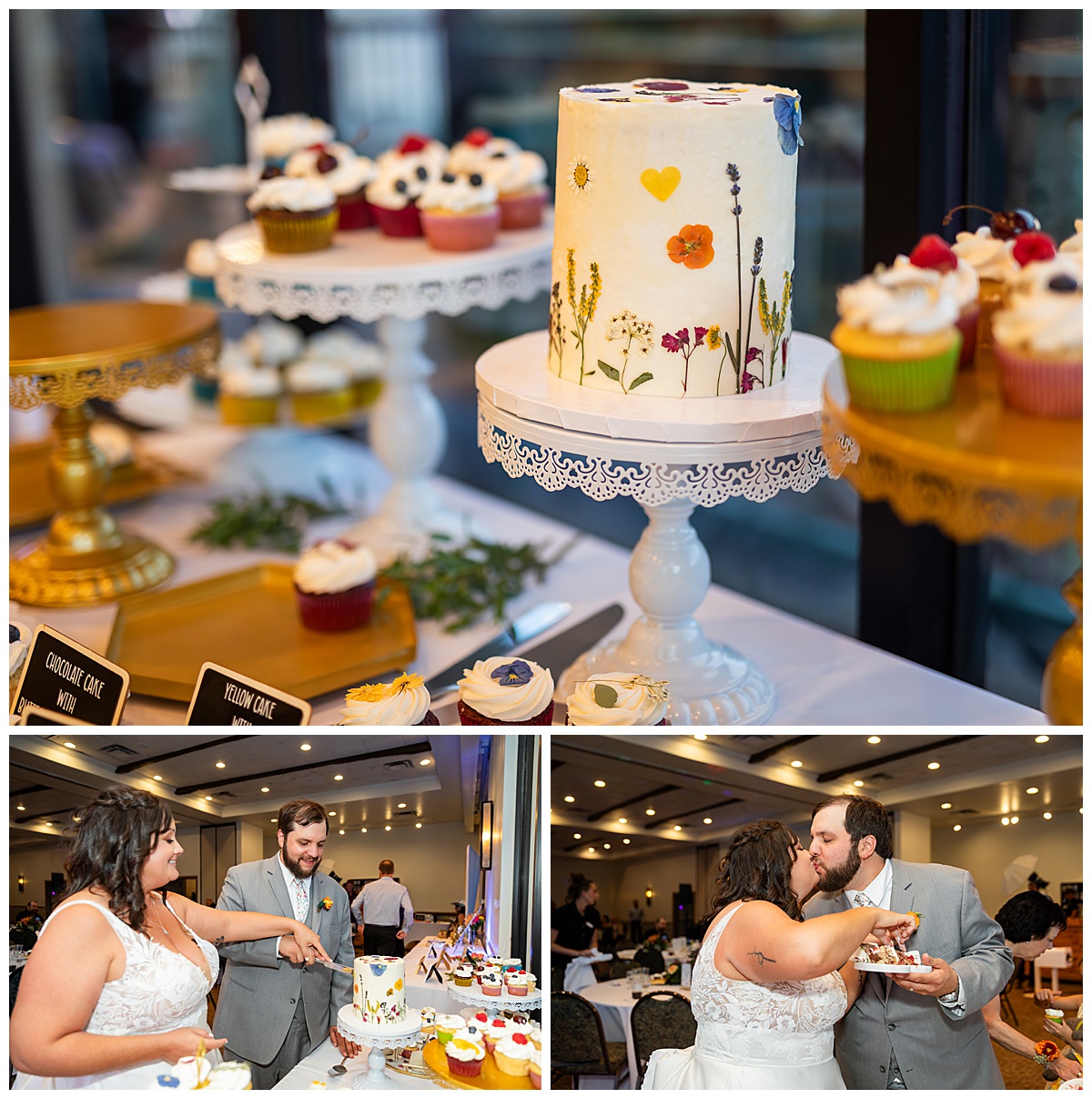 A close up of the cake. It is small and white with dried wildflowers all over it. It is surrounded by cupcakes. The bride and groom cut the cake and kiss.