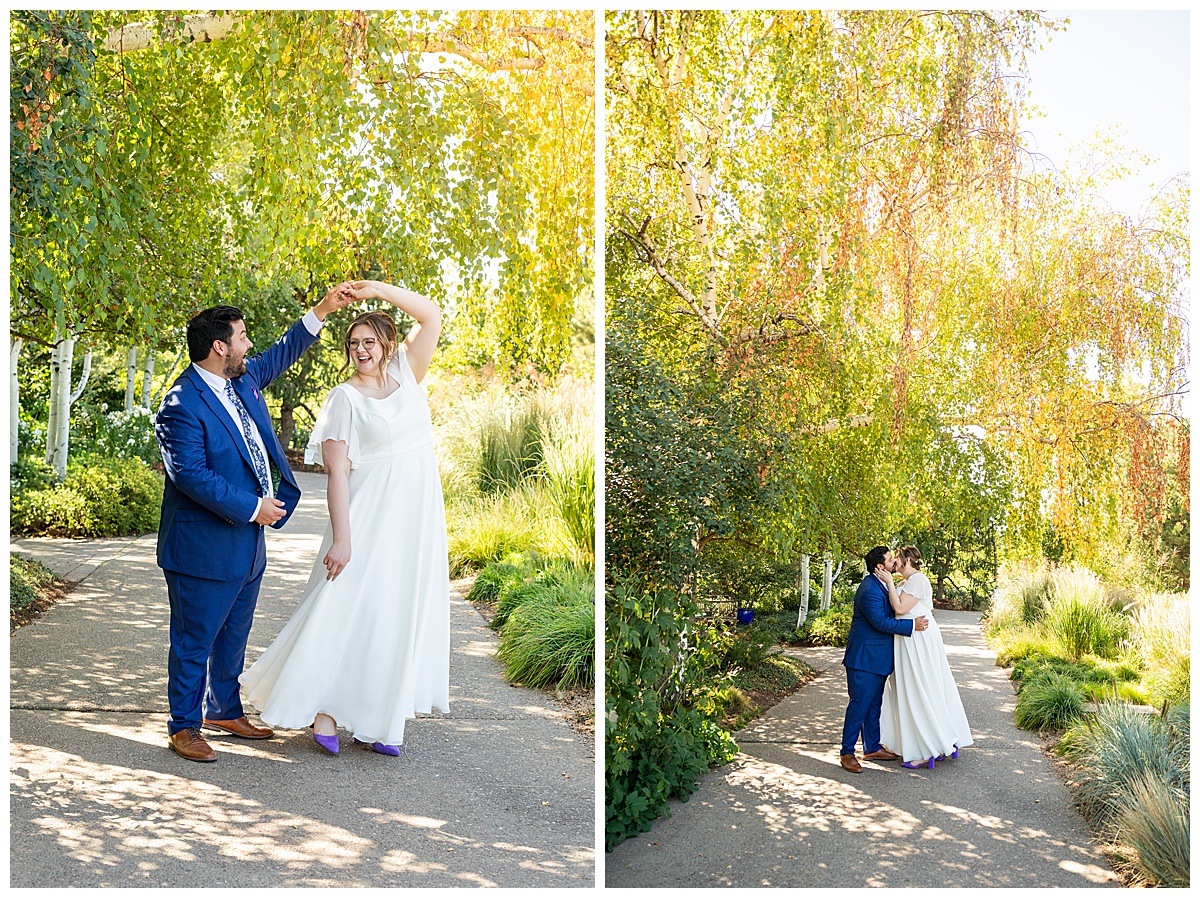 The bride and groom dance and kiss under trees starting to turn fall colors at their Denver Botanic Gardens wedding.