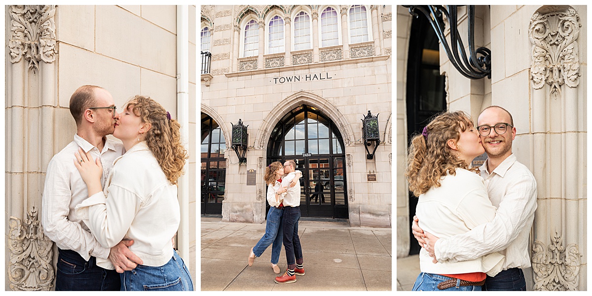 Lily & Cody pose in front of Downtown Littleton's Town Hall Art Center. Lily has curly brown hair and is wearing a red shirt, a cream jacket, and jeans. Cody is wearing glasses with a cream button down shirt and jeans.