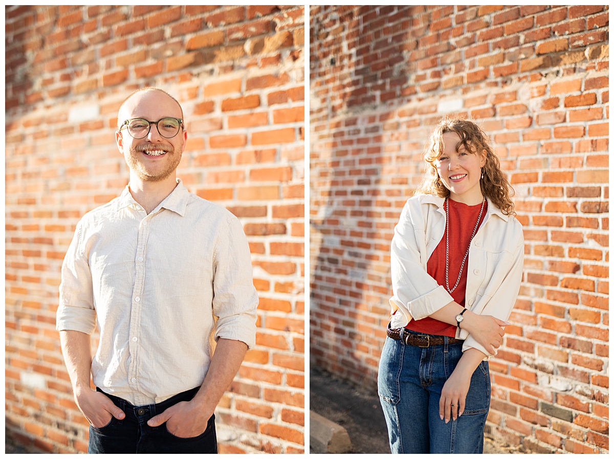 Lily & Cody pose in front of a red brick wall. Lily has curly brown hair and is wearing a red shirt, a cream jacket, and jeans. Cody is wearing glasses with a cream button down shirt and jeans.