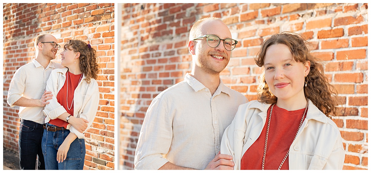 Lily & Cody pose in front of a red brick wall. Lily has curly brown hair and is wearing a red shirt, a cream jacket, and jeans. Cody is wearing glasses with a cream button down shirt and jeans.